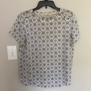 Black and white blouse with gold button detail